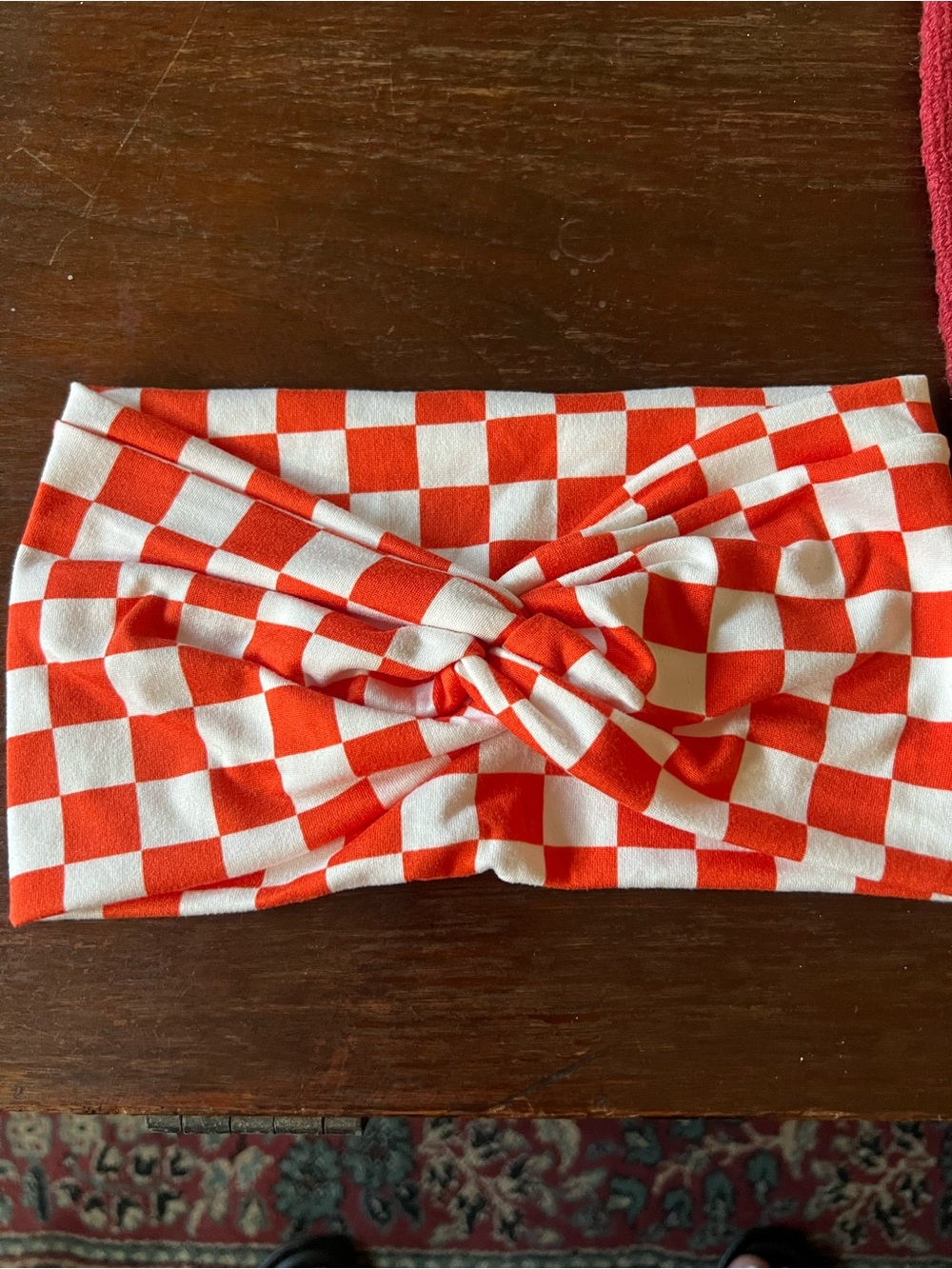 Orange and white checkered HelloHeadband wide twist